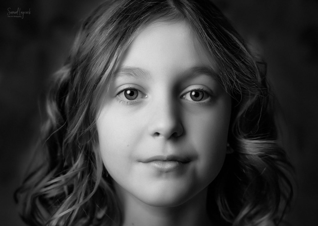 Young girl close to the camera with beautiful eyes
