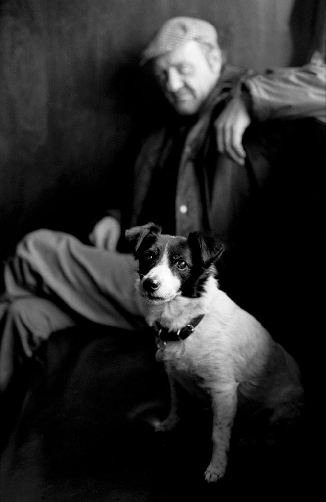 Rag & Bone Man With His Terrier Dog In A Pub